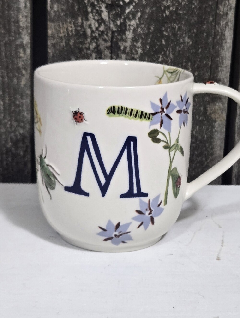 Anthropologie White Ceramic Mug with Blue Monogram and Floral Accents